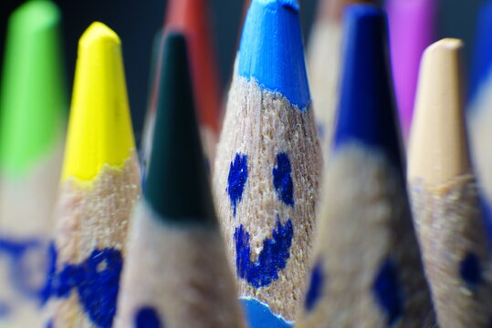 happy expression of colored pencils