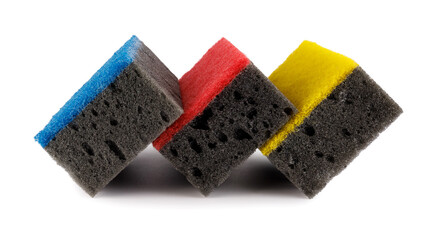 Black and colored household sponges laid out in a row isolated on a white background. Sponge for washing dishes .
