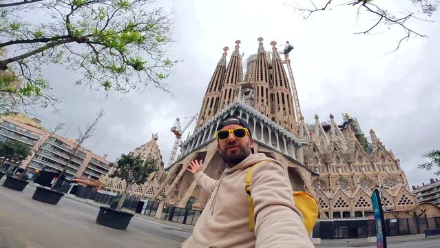 Selfie of a tourist on vacation at the Sagrada Familia Basilica in Barcelona, Spain