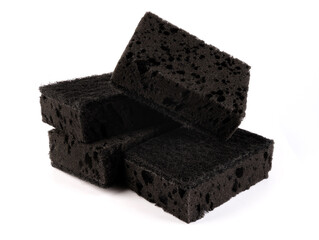 Sponge for washing dishes . Completely black household sponge.