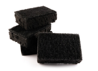 Sponge for washing dishes . Completely black household sponge.