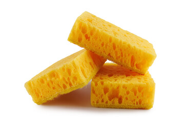Several yellow sponges for washing dishes isolated on a white background. Household cleaning sponge.