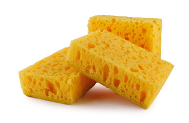 Several yellow sponges for washing dishes isolated on a white background. Household cleaning sponge.