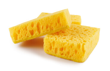 Several yellow sponges for washing dishes isolated on a white background. Household cleaning sponge.