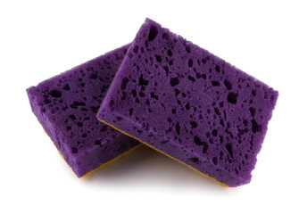Several purple and yellow dishwashing sponges isolated on a white background. Household cleaning sponge.