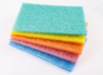 Multi-colored cleaning sponge. Background made from multi-colored cleaning cloth.