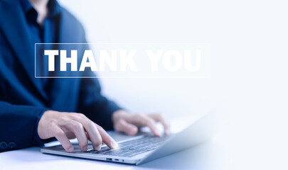 businessman sends a message to thank you on a laptop. concept of thank you business, appreciation...