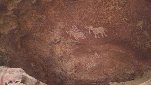 Pan shot of prehistoric rock paintings in rock shelters and caves of Bhimbetka in Bhopal Madhya Pradesh India