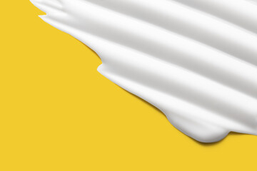 Cream skincare texture on yellow background. Sunscreen cosmetic moisturizer swatch. White creamy product closeup