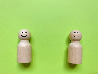 Smiley face on toy blocks background. Extrovert introvert concept. Stock photo.