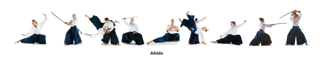 Man and woman, concentrated athletes fighting at Aikido training in martial arts school isolated...