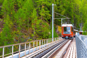Zermatt, Switzerland. Gornergrat train on bridge