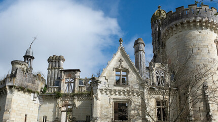 Renaissance castle of  La Mothe-Chandeniers, France. A RENAISSANCE/NEOGOTHIC-style castle of the "châteaux de la Loire" region, France. it is now being restored. Vegetation has grown inside since 85 