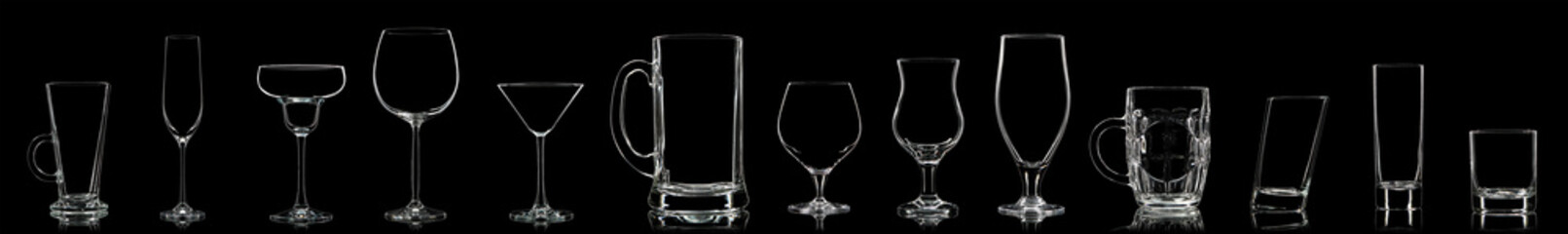 Silhouette of multicolor different glasses on black background