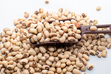 Cowpea, Heap of peas isolated on white background. cow-peas on spoon