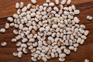 Cowpea, Heap of peas on wooden background.