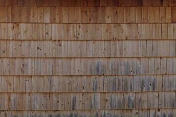 Wood shingle roof background, roof texture, pattern.