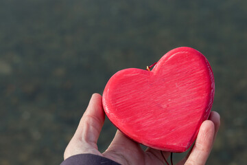 Wooden Heart in Hand