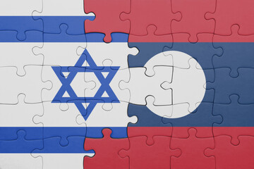 puzzle with the colourful national flag of israel and flag of laos .