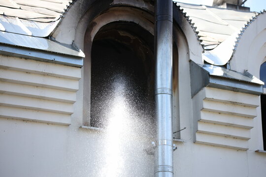 Fire in the church temple. The church cathedral is on fire. Heavy smoke in the temple area. The roof of the cathedral caught fire. Fire in the church.