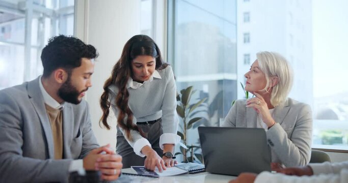 Meeting, paperwork and business people in office with laptop for planning, strategy or brainstorming ideas. Budget, tax data and teamwork at table for growth, development or risk management research.