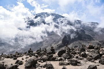 Mountainous landscape with rocky terrain covered in large, grey boulders