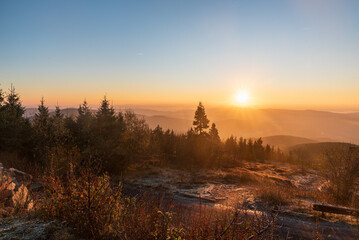 Sunrise from Lysa hora hill in Moravskoslezske Beskydy mountains in Czech republic