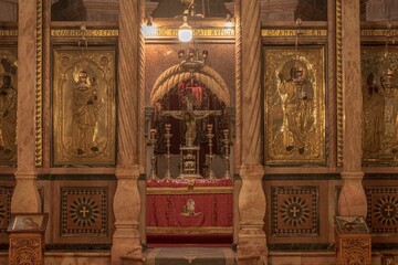 Grand church with ornate golden doors and elegant pulpits: Jerusalem