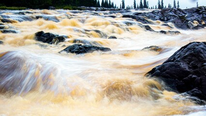 Scenic river winding through a picturesque rocky landscape