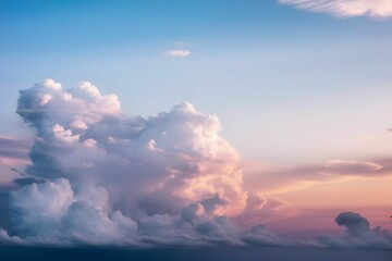 Stunning view of the pinkish-blue sky featuring a beautiful cloud formation. © Wirestock