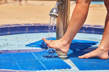 Picture of washing legs before pool entrance