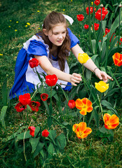 child with tulips
