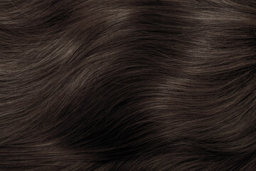 Naklejka premium Brown hair close-up as a background. Women's long brown hair. Beautifully styled wavy shiny curls. Hair coloring. Hairdressing procedures, extension.