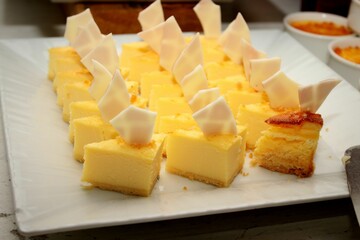 Freshly baked lemon cheesecake served on the table during the event