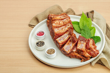 Marinated raw ribs with spices and herbs. Traditional ingredient for BBQ, picnic concept