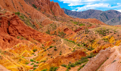 Natural unusual landscape red canyon of extraordinary beauty is similar to the Martian landscape. Multi-colored canyon fairy tale in Kyrgyzstan. Charyn Canyon. Amazing beautiful landscape.
