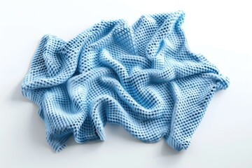 Cozy blue knitted blanket on white background, perfect for home decor