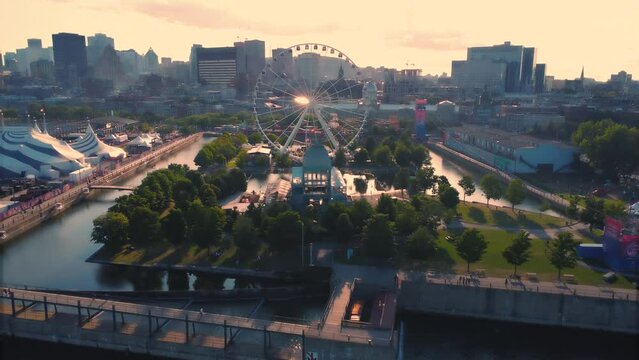 Aerial of the La Grande Roue de Montreal Ferris Wheel in Montreal during the sunset