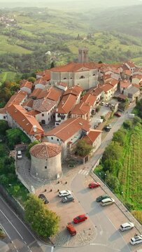 Smartno townscape and vineyards in Goriska Brda countryside region of Slovenia. Aerial view of the Smarno old town at sunset