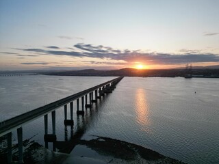 Obraz premium Aerial view of Tay Road Bridge in Dundee, Scotland at sunset
