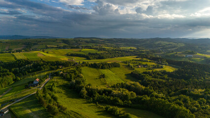 Lesser Poland rolling hills and rural landscape near Ciezkowice. Aerial drone view