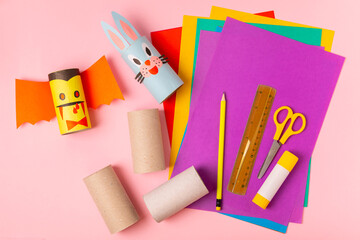 Toilet paper crafts on a colored background. Kids crafts made with toilet paper roll. DIY....