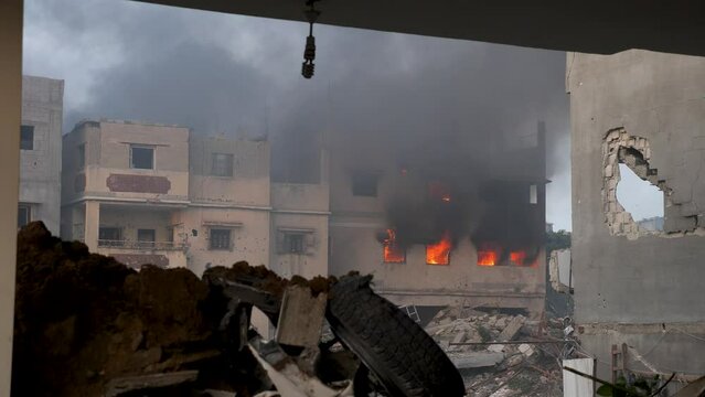 Buildings in the Gaza Strip being destroyed by Israeli missiles during Israel&ndash;Hamas war