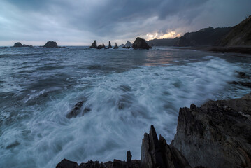 Dramatic seascape with stormy skies in Cantabria