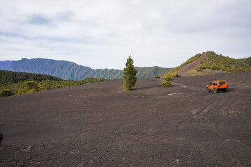 4x4 car in volcanic sand in Llano del Jable, La Palma, Canary islands.