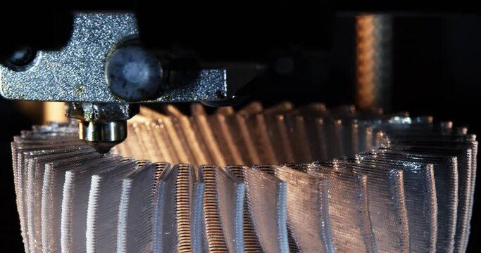 3D printer working. Fused deposition modeling, FDM. 3D printer printing an object from plastic. Automatic three dimensional 3d printer performs plastic. Progressive additive technology for 3d printing