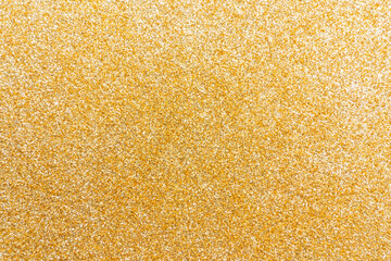 Golden glitter texture background with sequins and sparkles