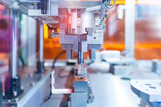 automatic clamp arm pick and place metal parts, Manufacturing, industrial, engineering, ai, automated technology concept