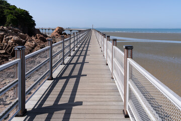 View of the wooden bridge on the beach