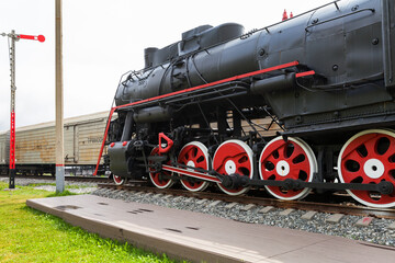 Restored historical steam locomotive L-4657 at Port Baikal station - a tourist attraction of the Circum-Baikal Railway on Baikal Lake